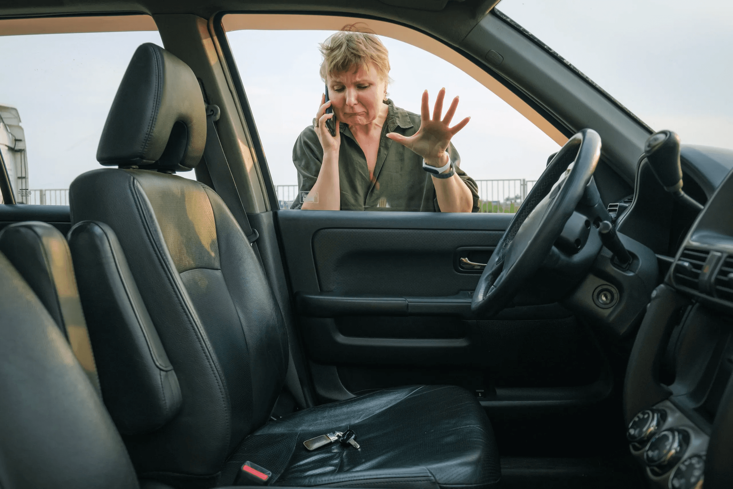 Locksmith holding a set of car keys
